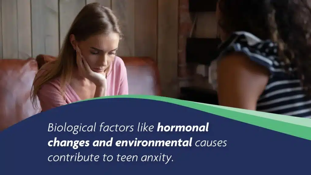 Teen girl resting her head in her hands. Biological factors like hormonal changes and environmental causes contribute to teen anxiety.